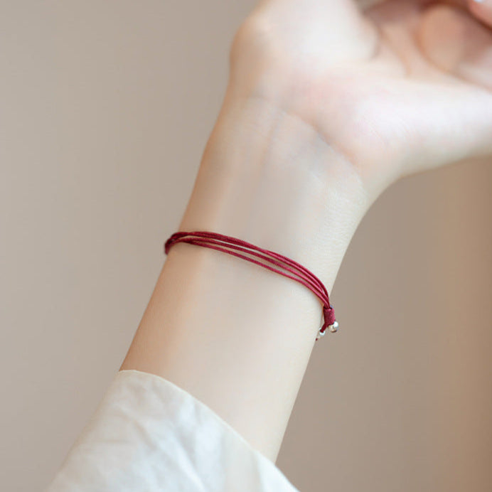 Lumina Aura Embrace Ancient Eastern Blessings with Our Auspicious Red String Bracelet